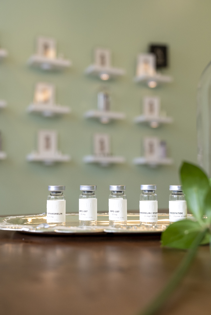 Peptide vials displayed inside The Charleston Atelier