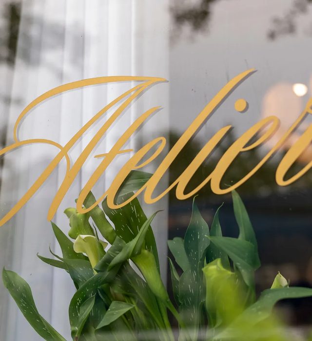 Atelier lettered in gold on the Cannon Street window